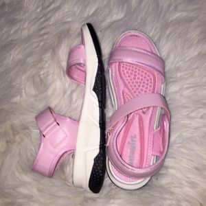 Pink platforms with thick white soles. Never worn